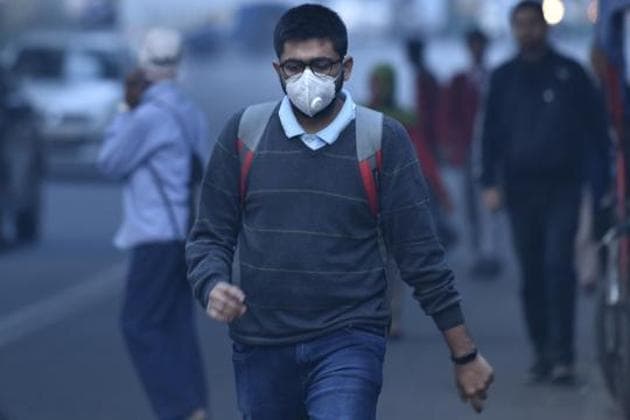 A man walks while wearing an aniti-pollution mask during a cold winter morning in New Delhi, IN. (Sanchit Khanna/ Hindustan Times) A man walks while wearing an aniti-pollution mask during a cold winter morning in New Delhi, IN. (Sanchit Khanna/ Hindustan Times)