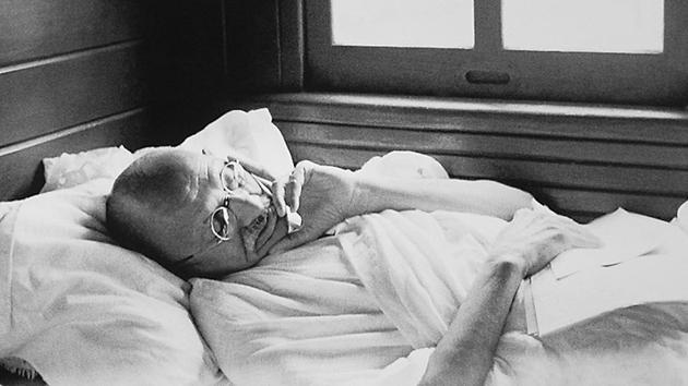 The day was June 25, 1934 and Gandhi and Kasturba were on their way to the Pune Municipal Council auditorium where he was to deliver a speech before Congressmen. (In pic) Mahatma Gandhi rests during a train ride to South India.(NITIN SHASTRI/HT PHOTO)