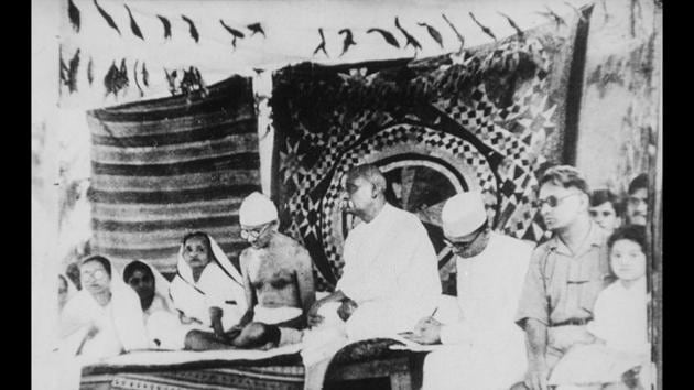 Gandhi with Sardar Vallabhai Patel during the Bardoli Satyagraha in Gujarat, 1928. The Mahatma came up with the term Satyagraha - literally, “holding on to truth” or, as Gandhi variously described it, truth-force, love force or soul-force – to describe his method of action in terms that also imbued it with moral content and authority. This philosophy enabled the farmers in Bardoli to challenge the unfair taxes that were levied on them by the government. (Courtesy National Gandhi Museum)