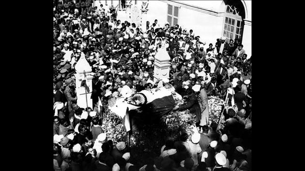 Mahatma Gandhi’s body at Birla House, New Delhi, 1948. Gandhi was assassinated on the evening of January 30 , 1948, in the grounds of the Birla House, now known as Gandhi Smriti Memorial. Unlike in later times when the remains of a departed leader would lie in state for two or three days to facilitate “antim darshan (last viewing),” Gandhi was cremated the following evening. (Courtesy National Gandhi Museum)