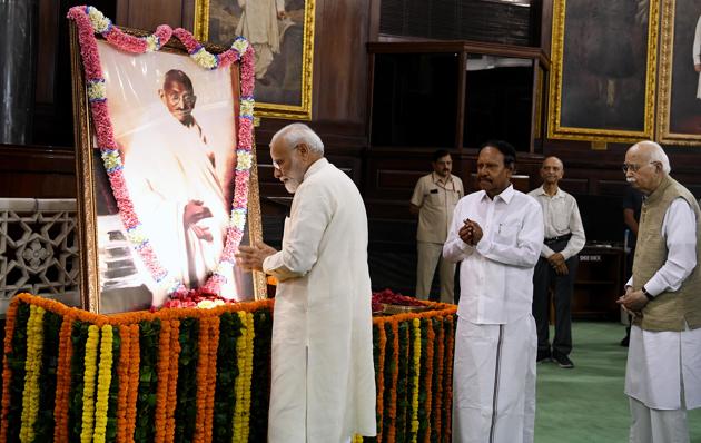 Prime Minister Narendra Modi pays tribute to Mahatma Gandhi on his 150th birth anniversary at Parliament House in New Delhi on Wednesday.(ANI photo)