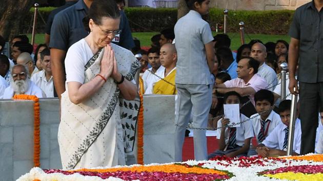 Sonia Gandhi pays homage at the Samadhi of Mahatma Gandhi on his 150th birth anniversary at Raj Ghat. (ANI Photo) Sonia Gandhi pays homage at the Samadhi of Mahatma Gandhi on his 150th birth anniversary at Raj Ghat. (ANI Photo)