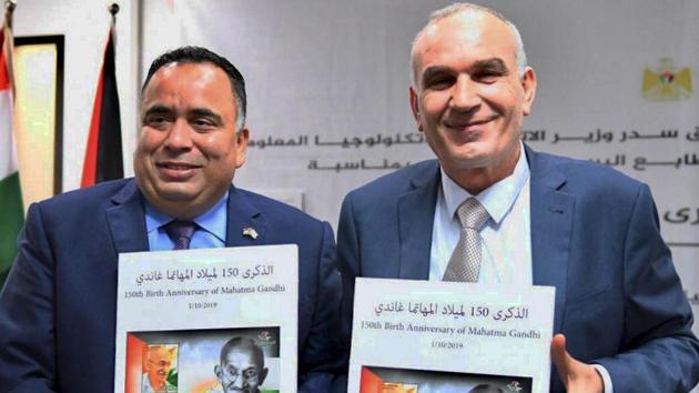 Representative of India (ROI) in Palestinian Authority Sunil Kumar and Palestinian Minister of Telecommunication and Information Technology, Dr. Ishaaq Seder release the commemorative stamp to honour Mahatma Gandhi on his 150th birth anniversary, in Ramallah, Israel.(PTI) Representative of India (ROI) in Palestinian Authority Sunil Kumar and Palestinian Minister of Telecommunication and Information Technology, Dr. Ishaaq Seder release the commemorative stamp to honour Mahatma Gandhi on his 150th birth anniversary, in Ramallah, Israel.(PTI)