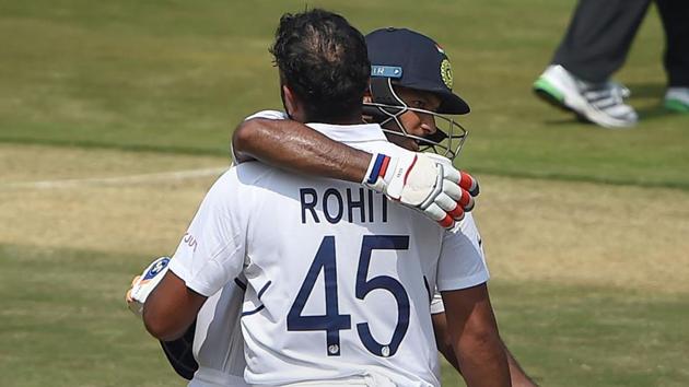 Visakhapatnam: India's Rohit Sharma being greeted by partner Mayank Agarwal as he celebrates his century(PTI)
