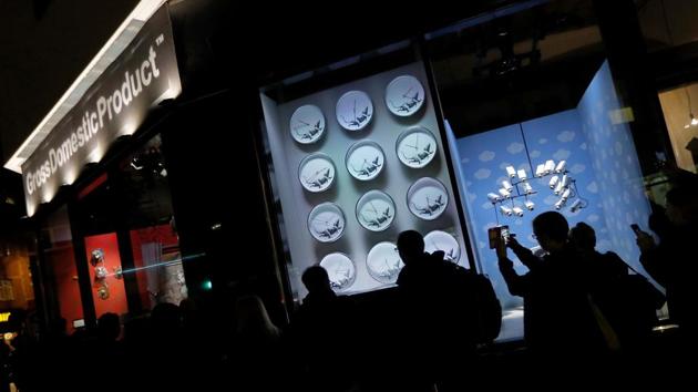 Original artworks by British artist Banksy form part of an installation inside a shop front. (REUTERS)