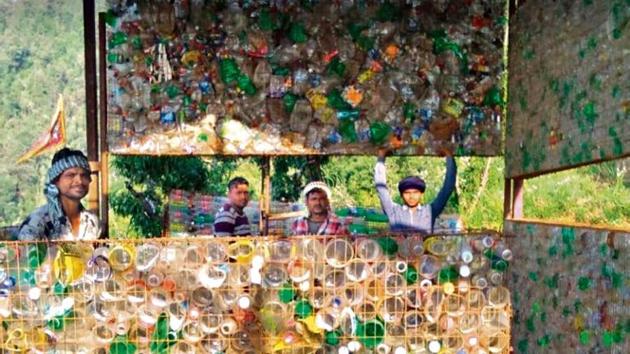 A homestay made of used plastic bottles in Hartola village in Nainital district of Uttarakhand. Over 26,000 bottles were used to make the four-room homestay. (HT Photo) A homestay made of used plastic bottles in Hartola village in Nainital district of Uttarakhand. Over 26,000 bottles were used to make the four-room homestay. (HT Photo)