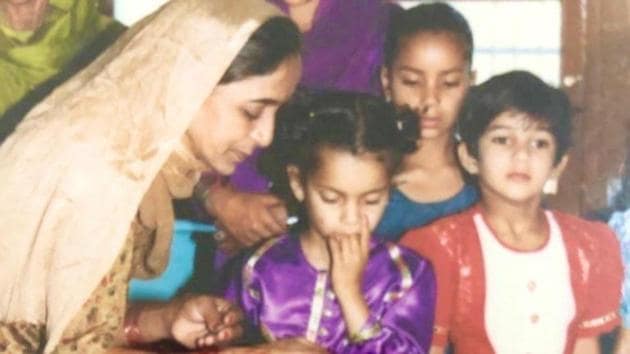 Kangana Ranaut, as a child, is seen sucking on her fingers. (Twitter) Kangana Ranaut, as a child, is seen sucking on her fingers. (Twitter)