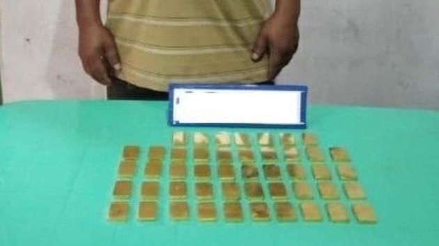The gold biscuits seized by the Assam Rifles in Manipur on Tuesday.(ht photo)
