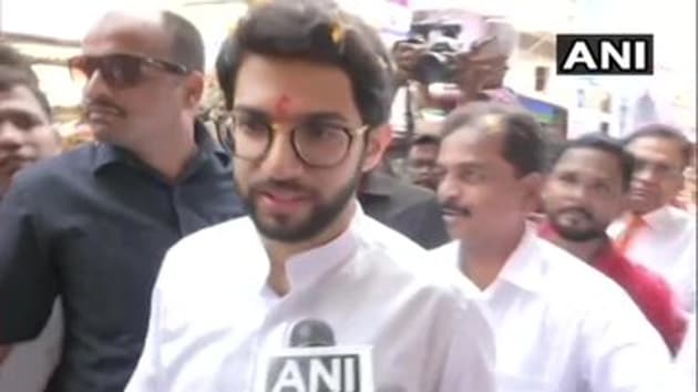 Thackeray waved and greeted his supporters from an open vehicle as his nomination rally passed through streets of Worli. (ANI PHOTO) Thackeray waved and greeted his supporters from an open vehicle as his nomination rally passed through streets of Worli. (ANI PHOTO)