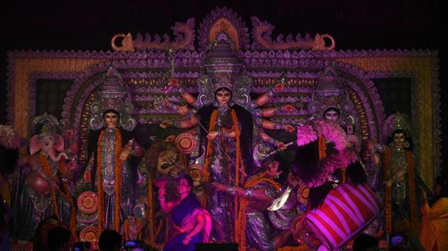 People celebrate Durga Puja at Aram Bagh Pandal at R K Ashram, in New Delhi. (Biplov Bhuyan/ Hindustan Times)