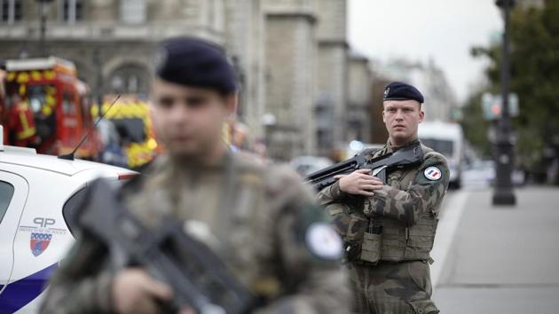 Armed soldiers patrol after an incident at the police headquarters in Paris, Thursday, Oct. 3, 2019.(AP)