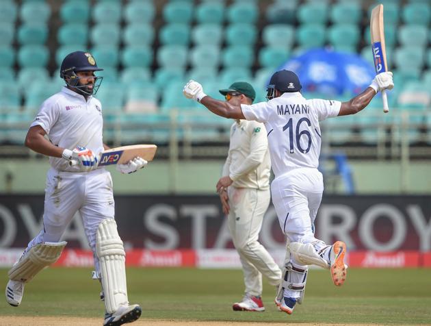 Visakhapatnam: India's Mayank Agarwal celebrates after scoring a maiden century on the 2nd day of the first test cricket match between India and South Africa. (PTI)
