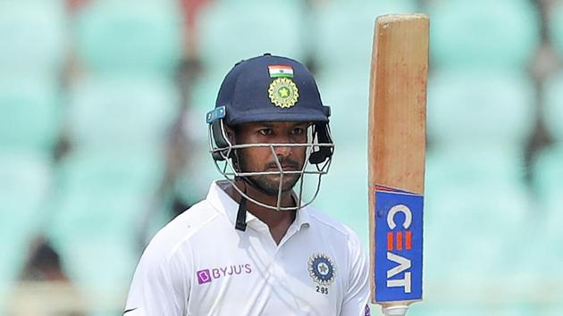 India's Mayank Agarwal raises his bat. (AP)