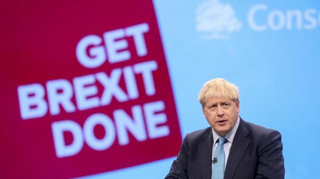 Boris Johnson delivers his keynote speech on the closing day of the annual Conservative Party conference at Manchester Central in Manchester, UK.(Bloomberg photo) Boris Johnson delivers his keynote speech on the closing day of the annual Conservative Party conference at Manchester Central in Manchester, UK.(Bloomberg photo)