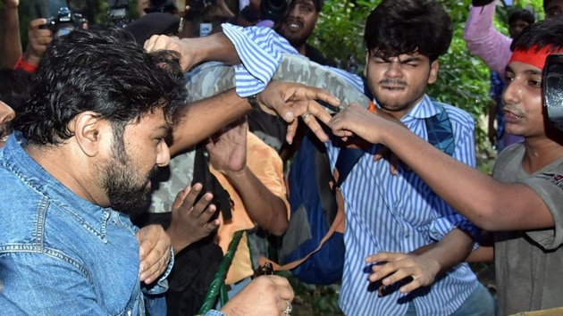 Debanjan Ballabh, Jadavpur University student, seen pulling Babul Supriyo’s hair when the latter visited the campus on September 19. (ANI photo) Debanjan Ballabh, Jadavpur University student, seen pulling Babul Supriyo’s hair when the latter visited the campus on September 19. (ANI photo)