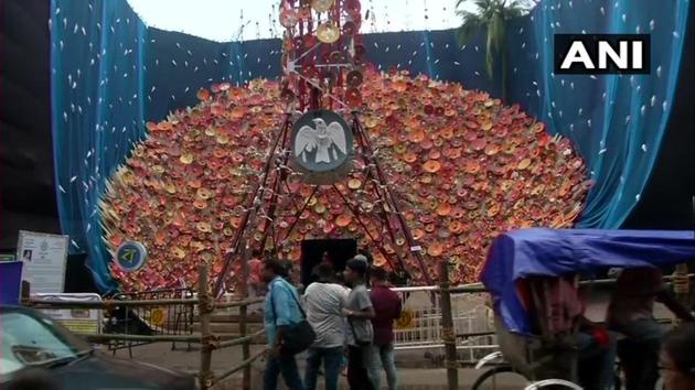 The Barisha club has designed the exterior of the pandal with artificial mobile tower and a dish TV antenna along with skeletons of hundreds of birds stuck on the tower who die due to high radiation.(Twitter/ANI)