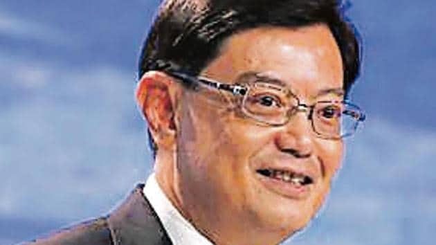 The world economy is at a crossroads with many countries adopting protectionism while looking to deepen globalization, Singapore’s deputy prime minister, Heng Swee Keat, said
