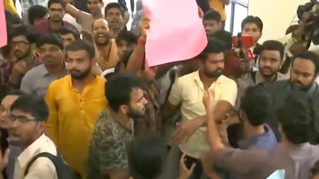 A scuffle broke out between two sections of students in the Jawaharlal Nehru University (JNU) on Thursday during a talk organised by the administration on the scrapping of Article 370 in Kashmir. (ANI Photo) A scuffle broke out between two sections of students in the Jawaharlal Nehru University (JNU) on Thursday during a talk organised by the administration on the scrapping of Article 370 in Kashmir. (ANI Photo)