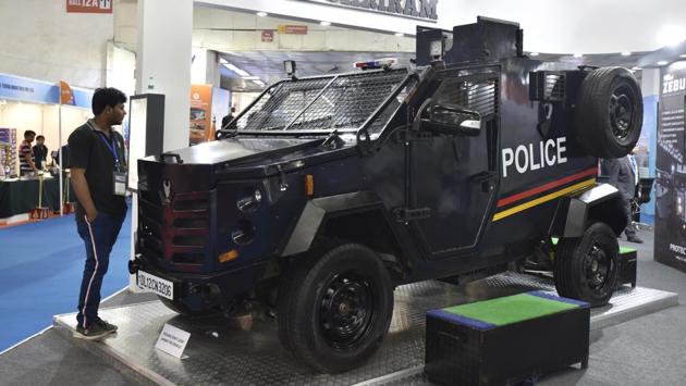 A visitor looks at a police jeep that is on display at the show. Previous editions of the event have established a benchmark, setting up a legacy in terms of participation of high-profile stakeholders from across the world. (Sanjeev Verma / HT Photo) 