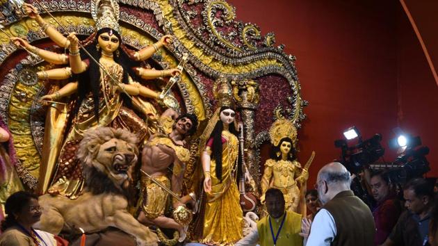 Bharatiya Janata Party (BJP) National President and Minister of Home Affairs Amit Shah during the opening of Durga Puja of BJ Block, Salt Lake in Kolkata. (Samir Jana/ Hindusttan Times)