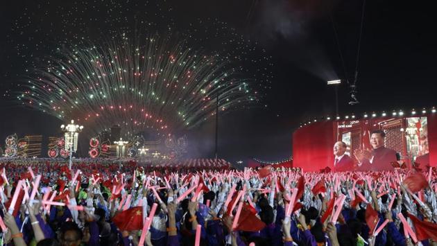 Chinese President Xi Jinping is displayed on a screen as he applauds during the gala evening held on Tiananmen Square for the 70th anniversary of the founding of the People's Republic of China in Beijing. Tiananmen Square is both where leader Mao Zedong declared the founding of the People's Republic of China in 1949 and where pro-democracy protesters rallied in 1989 before being quashed by the military in a bloody crackdown. (Ng Han Guan / AP)
