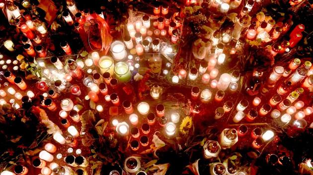 A photo of Czech singer Karel Gott is placed amid candles in front of his house in Prague, Czech Republic. Czech pop singer Karel Gott, who was a particular favourite in neighbouring Germany where media once dubbed him the "Sinatra of the East", died at 80. (Michal Cizek / AFP)