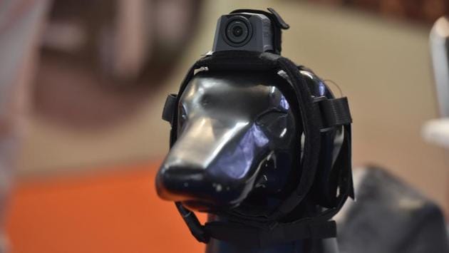 A camera that can be fitted on the head of dogs for surveillance purposes. The camera lets operators know the desired location and is used for tracking information. In line with Prime Minister Narendra Modi’s vision of ‘Make in India’, this year’s edition of the expo aims to create a powerful roadmap leading to Indian defence becoming self-reliant. (Sanjeev Verma / HT Photo) 