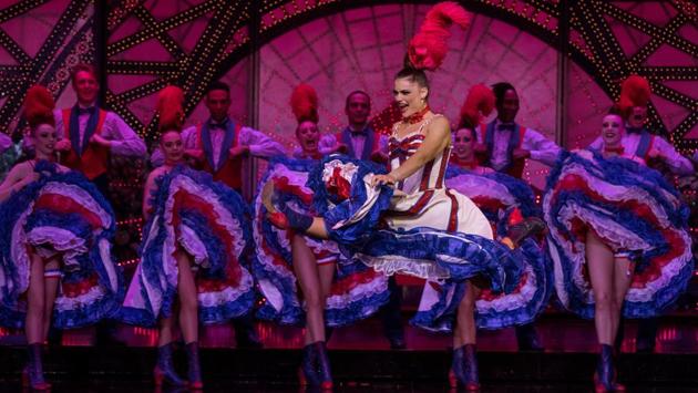 French Cancan soloist Olga Khokhlova, a dancer from ex-Soviet Kazakhstan, performs at the Moulin Rouge. Khokhlova has been at the Moulin Rouge for 12 years. "I love the adrenaline of the stage. The Moulin is a magical place where I live out my passion" she said. "When I’m on stage, I know that I am the inheritor of famous dancers who for 130 years have made the Moulin Rouge." (Philippe Wojazer / REUTERS)