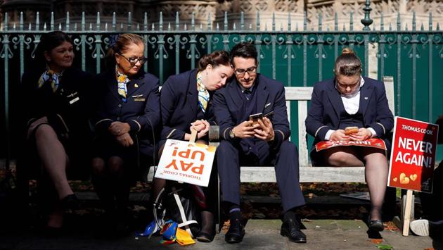 Ex-Thomas Cook employees demonstrate in London, Britain, after delivering a petition calling for a full inquiry into Thomas Cook's collapse and for the company's directors to pay back their bonuses. British travel firm Thomas Cook collapsed on September 23, leaving hundreds of thousands of holidaymakers stranded and sparking the UK's biggest repatriation since World War II. (Tolga Akmen / AFP)