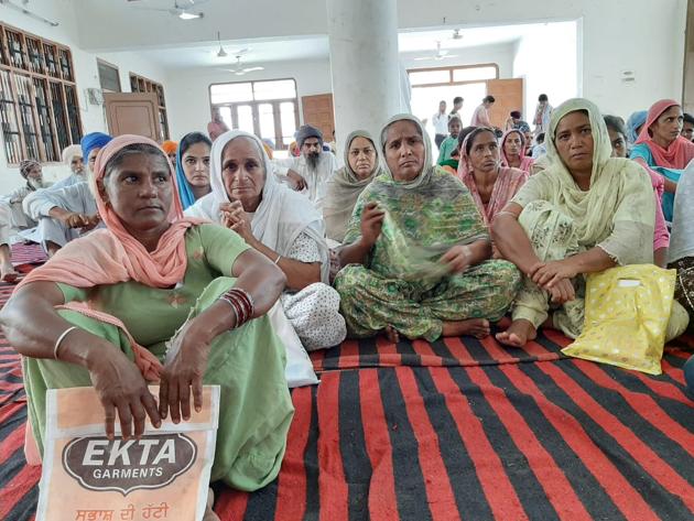 Family members of Punjab farmers, who committed suicide due to debt, at Naina Devi Temple in Sangrur on Saturday.(HT PHOTO)