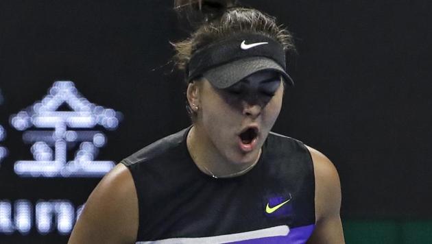 Bianca Andreescu of Canada reacts after scoring a point against Naomi Osaka.(AP)
