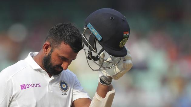 India's Cheteshwar Pujara leaves after being dismissed by South Africa's Vernon Philander during the fourth day of the first cricket test match against South Africa in Visakhapatnam.(AP)