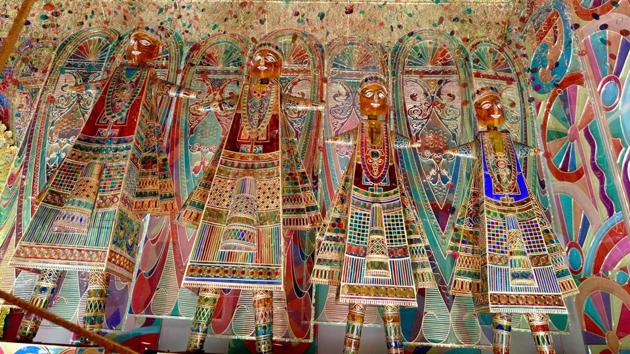 With the theme as ‘colour,’ the idols at Samaj Mudiali club have been created by artist Gauranga Kuilya. The pandal has been made of acrylic sheet with glass painting. (Samir Jana / HT Photo)