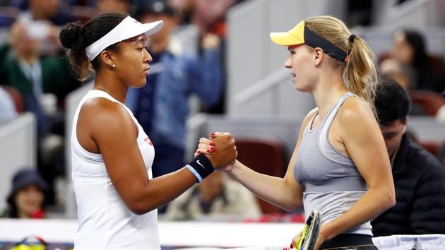 Naomi Osaka of Japan and Caroline Wozniacki of Denmark after Osaka won the match.(REUTERS)