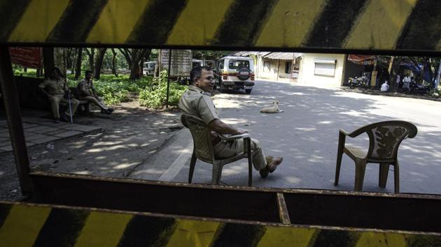 Aarey colony check naka has been cornered off by Mumbai police as police has denied entry to local public at Aarey Colony, Goregoan in Mumbai.(Satish Bate/HT Photo)