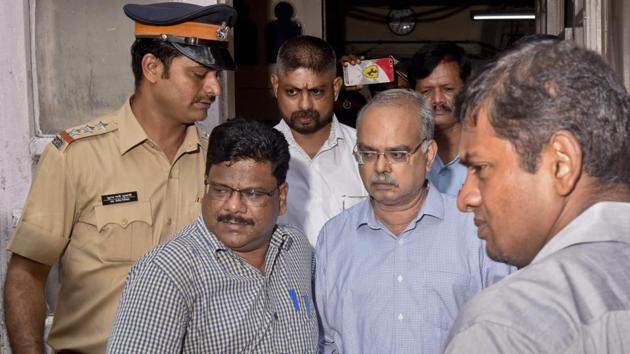 Joy Thomas, former MD of PMC Bank is produced before a Killa Court after his arrest, after the Economic Offence Wing of Mumbai Police registered a case against senior officials of Housing Development and Infrastructure Ltd (HDIL) and PMC bank in connection with a fraud of over Rs 4,355 crores in Mumbai, Maharashtra. He was on the run after the case was registered. (Kunal Patil / Hindustan Times)