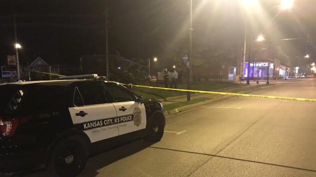 In this image from 41 KSHB Kansas City Action News police work the scene of a shooting outside a Kansas City, Kansas bar on Sunday. (AP) In this image from 41 KSHB Kansas City Action News police work the scene of a shooting outside a Kansas City, Kansas bar on Sunday. (AP)