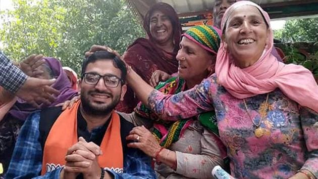 BJP candidate from Dharamshala Vishal Nehria during a poll campaigning in Kangra on Sunday. (HT Photo) BJP candidate from Dharamshala Vishal Nehria during a poll campaigning in Kangra on Sunday. (HT Photo)