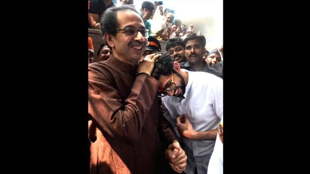 Shiv Sena candidate Aditya Thackarey takes blessings from his father Shiv Sena Chief Uddhav Thackarey after filling the nomination for the upcoming state election from Worli in Mumbai, Maharashtra. (Anshuman Poyrekar / HT Photo)