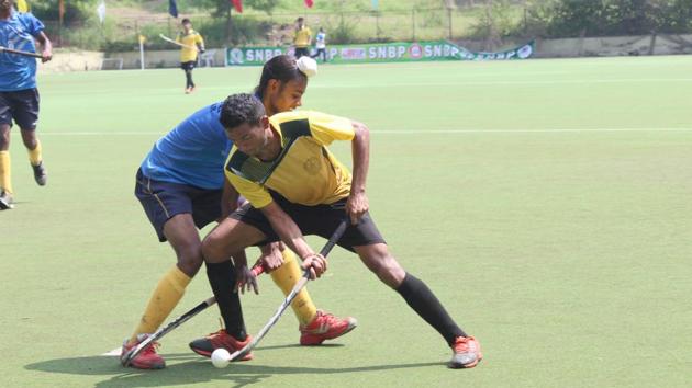 SNBP (yellow) VS SGPC Amritsar (blue) in action during the 4th SNBP all India hockey tournament at Balewadi in Pune, India, on Saturday,October,05, 2019. (HT PHOTO) SNBP (yellow) VS SGPC Amritsar (blue) in action during the 4th SNBP all India hockey tournament at Balewadi in Pune, India, on Saturday,October,05, 2019. (HT PHOTO)