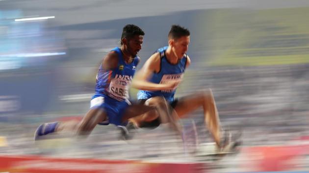 India’s Avinash Sable and Athlete Refugee Team’s Otmane Nait Hammou in action during the Men’s 3000 Metres Steeplechase Heats at the World Athletics Championships in Qatar, Doha. Sable qualified for Tokyo Olympics in 3,000m steeplechase, shattering his own national record for the second time in three days though he finished 13th in the final race of the World Championships. (Lucy Nicholson / REUTERS)