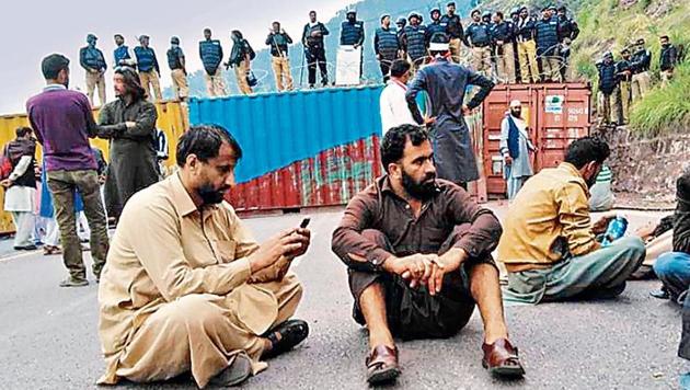 JKLF supporters were stopped near LoC as PoK police put shipping containers to block the roads.(HT Photo)