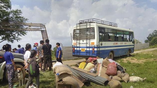 Kanchanpur: Displaced Bru refugee families board a bus to return to Mizoram as part of a home ministry-sponsored rehabilitation programme, in Kanchanpur, Tripura. M(PTI)
