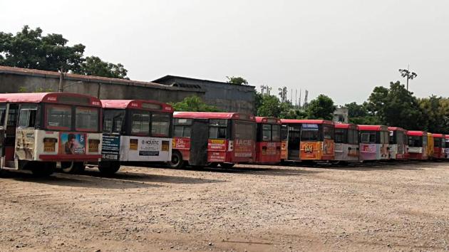 Buses stand at as TSRTC employees are on an indefinite strike demanding fulfilment of various demands including RTC merger with the Government, in Hyderabad on Saturday. (ANI Photo) Buses stand at as TSRTC employees are on an indefinite strike demanding fulfilment of various demands including RTC merger with the Government, in Hyderabad on Saturday. (ANI Photo)