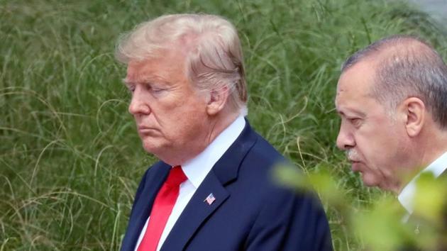 U.S. President Donald Trump and Turkish President Tayyip Erdogan speak at the start of the NATO summit in Brussels, Belgium July 11, 2018. (REUTERS) U.S. President Donald Trump and Turkish President Tayyip Erdogan speak at the start of the NATO summit in Brussels, Belgium July 11, 2018. (REUTERS)