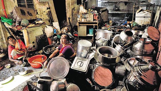 Residents of Tangewala Colony are still cleaning their houses and belongings even though it has been a week since the flash flood incident. (Rahul Raut/HT PHOTO) Residents of Tangewala Colony are still cleaning their houses and belongings even though it has been a week since the flash flood incident. (Rahul Raut/HT PHOTO)