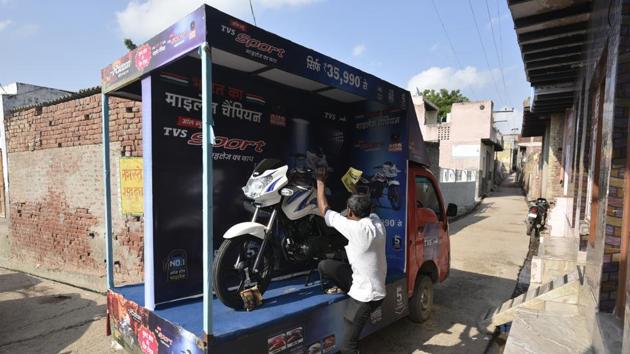 “We had 37 bigha land, but no money, and subsisted on income from our farms. Now while everyone in this village is a crorepati, none knows how to handle the money. I thought at least we should improve our lifestyle,” Shriram said. His old motorcycle, his lifeline for over a decade, remains unused for over two months. (Biplov Bhuyan/HT PHOTO)