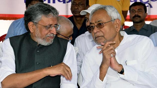 Bihar deputy chief minister Sushil Kumar Modi in conversation with CM Nitish Kumar during an event in Patna. (ANI File) Bihar deputy chief minister Sushil Kumar Modi in conversation with CM Nitish Kumar during an event in Patna. (ANI File)