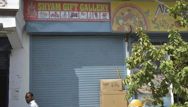 The shop where he was shot in Chiranjeev Vihar on Monday.(Sakib Ali/HT)