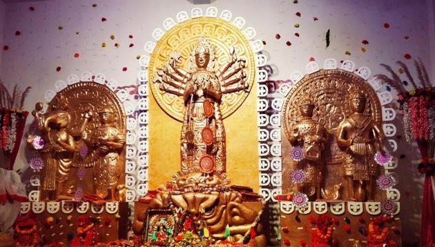 The idol of Durga is about 8 feet high and her four sons and daughters are about 5 feet in height. (HT PHOTO.) The idol of Durga is about 8 feet high and her four sons and daughters are about 5 feet in height. (HT PHOTO.)